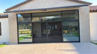 Porte coulissante verticale à double battant en aluminium insonorisée de style américain pour villa résidentielle, certifiée FSC CE