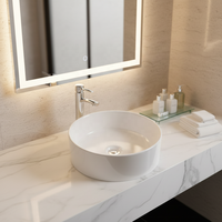 Lavabo en céramique de forme ronde moderne pour salle de bain, à poser sur le comptoir