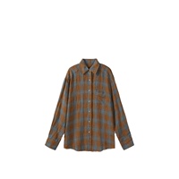 Chemise femme en lin lavé uni respirant à manches longues, boutonnée sur le devant, col rabattu, poche poitrine, ourlet effiloché, coupe ample, style vintage