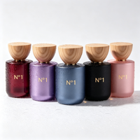 Flacon de parfum rond en verre givré au design élégant OEM ODM, 30 ml, 50 ml, 100 ml, flacon pulvérisateur cosmétique vide avec boîte d'emballage