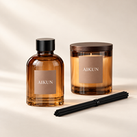 Ensemble diffuseur de parfum et bougie parfumée AIKUN en verre ambré de luxe avec logo personnalisé et bâtonnets aromatiques noirs pour la décoration de la maison