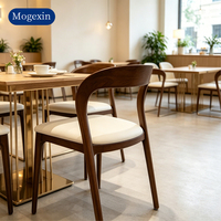 Moderner Leder- & Holz-Esszimmerstuhl mit Gepolstertem Sitz im Mid-Century-Design für Esszimmer & Wohnzimmer Gewerbliche Nutzung Langlebig