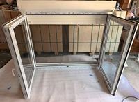 Ventana de PVC con Doble Apertura, Abatible y Giratoria, con Persianas Enrollables y Mosquitera Extraíble