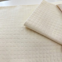 Tissu en aramide PTFE renforcé par grille avec retardateur de flamme intrinsèque pour barrière imperméable contre l'humidité dans les vêtements de protection