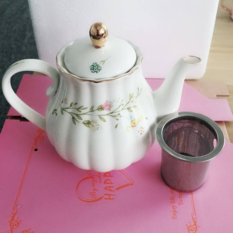 small yellow flower pot