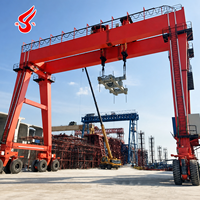 Grue portique à rotation 360° à poutre simple ou double, capacité 5, 10, 20, 50 tonnes, sur pneus en caoutchouc avec palan électrique