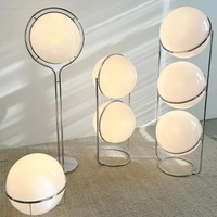 Lampe sur pied sphérique décorative de designer pour salon, style Bauhaus minimaliste, lampe sur pied globe moderne du milieu du siècle