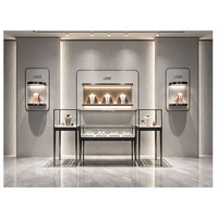 Meubles de magasin de bijoux haut de gamme sur mesure, table de présentation de bijoux en métal et verre, vitrine murale pour colliers avec éclairage LED