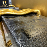 Table console de luxe haut de gamme noire avec feuille d'or pour hôtels et villas, table d'entrée design style galerie d'art