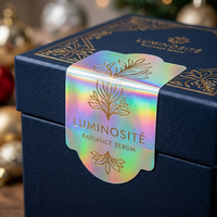 Étiquettes holographiques imperméables en rouleau |   Autocollants holographiques arc-en-ciel personnalisés au laser pour flacons de parfum, de rouge à lèvres, de cosmétiques et boîtes cadeaux