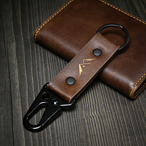 <span class=keywords><strong>Porte</strong></span>-clés tactique vintage en cuir Crazy Horse avec logo gravé au laser, portable pour les amateurs de plein air - Product Image 1