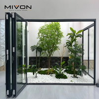 Porte accordéon pliante intérieure/extérieure abordable en aluminium à rail bas avec simple vitrage pour balcon