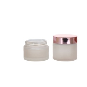 Tarro de Crema de Vidrio Esmerilado de 30g 50g con Tapa Rosada Dorada, Envase Cosmético en Forma de Cilindro con Tirador Manual - Product Image 1