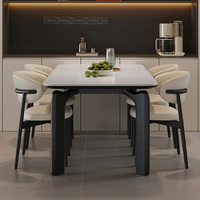 Table à manger en dalle moderne minimaliste italienne pour un usage domestique, petits espaces, avec pieds en acier au carbone + plateau en granit