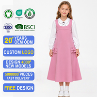Robe d'uniforme scolaire de haute qualité pour filles, sans manches, à volants et poches, avec bretelles, logo personnalisé, vente en gros OEM ODM