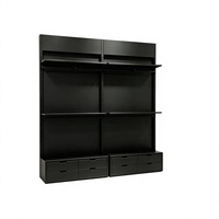 Système d'affichage modulaire en métal noir avec base à 12 tiroirs et design sans poignée pour magasin de détail haut de gamme