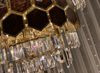 Lustre suspendu moderne de luxe en fer et cristal, éclairage LED avec télécommande, finition or bronze pour restaurants, hôtels, bars