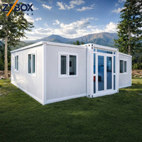 ZYBOX A1 Maison préfabriquée ignifuge tout blanche extensible en forme de T # 1 Vendeur mondial Livraison en 10 jours ADU Cabin