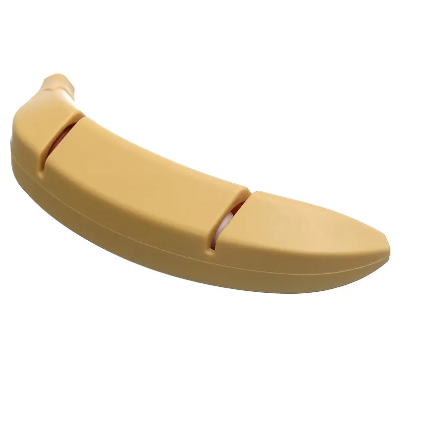 バナナ型ハンドヘルド研ぎ器は、はさみとナイフ用の滑り止めベースでブレードを修復し、研磨するのに役立ちます