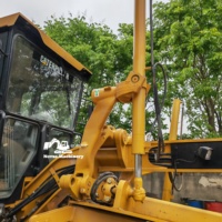 Niveleuse à moteur d'occasion CAT 140K 16T avec moteur puissant et système hydraulique fiable pour la construction routière, le nivellement et les travaux de terrassement