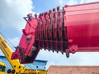 Grue hydraulique diesel d'occasion Sany STC1300C8 avec capacité de levage de 130 tonnes pour les projets énergétiques