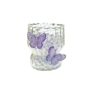 Tasse à café et à lait moderne et créative en verre, faite à la main, avec un design de papillon tridimensionnel et un motif de pétales, écologique et de haute qualité esthétique - Product Image 1