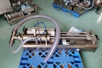 Machine de remplissage semi-automatique à faible viscosité, prix usine, de 1 à 5 L, pour liquides, pâtes, vin et shampoing