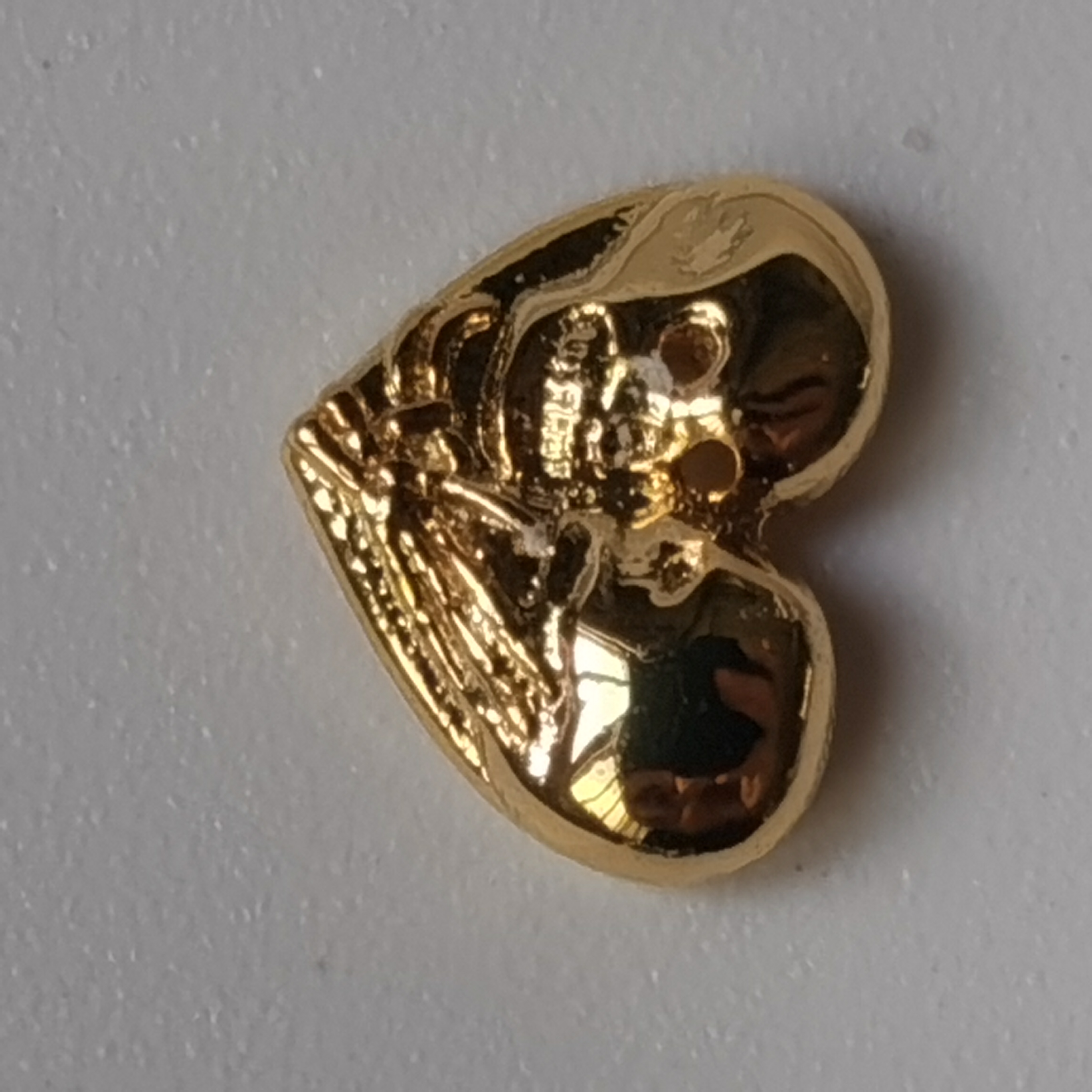 Bijoux dents de la mort en or 8 carats