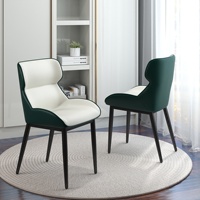 Chaise de salle à manger VOXHOME USA en stock, livraison directe, style moderne et luxueux, en cuir PU, avec pieds en métal, accoudoirs et dossier.
