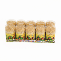 Cure-dents de nettoyage des dents cure-dents ronds en bois de bambou dans une boîte de rangement en plastique transparent