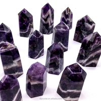 Vente en gros de tours de cristal d'améthyste naturelle, petites, polies, aux motifs élégants, pour la guérison et la décoration