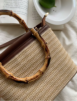 Sac bandoulière tendance pour femme, sac seau en paille tressée à porter à la main avec broderie décorative, nouveau petit sac tissé de niche