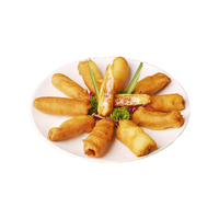 Rouleaux de printemps chinois traditionnels de Qingdao, surgelés, croustillants, faits maison, petits, végétaliens, fourrés aux légumes, crevettes et poulet, avec enveloppe de pâte