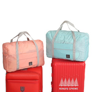 Huacai bagaj seyahat çantası su geçirmez naylon seyahat silindir çanta özel Logo katlanabilir bagaj depolama spor çantası - Product Image 2