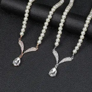 Venta al por mayor conjunto de joyería Cadena de perlas de lujo gota de agua colgante collar perla encanto pendientes para las mujeres