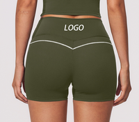 Shorts de sport pour femmes, blanc contrastant, avec ligne en V, effet push-up fessier, compression abdominale, extensible doux 4 pouces, pour gym, fitness et yoga