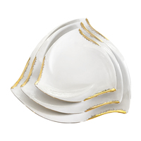 Ensemble d'assiettes à dîner en porcelaine avec bordure dorée de luxe, petit bol en céramique, design européen, sûr pour la maison et l'hôtel, vente en gros directe d'usine