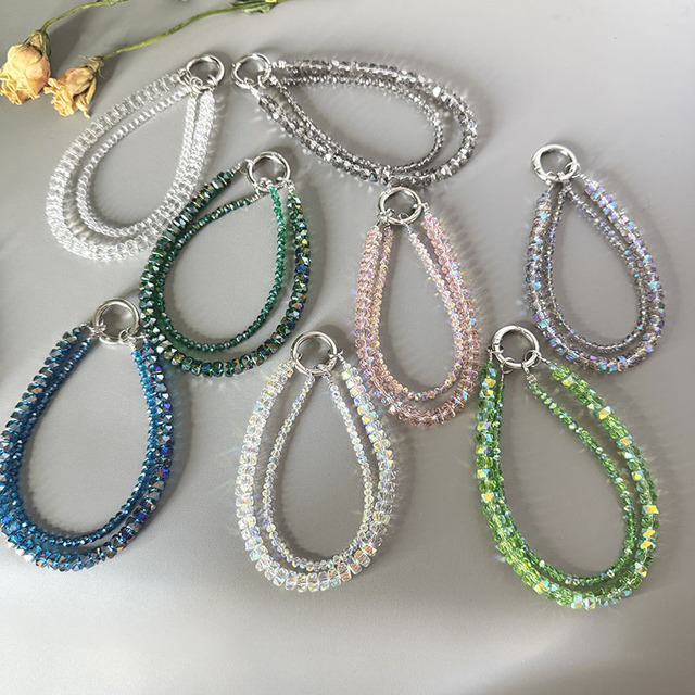 Double-layer crystal mobile phone chain - an elegant wrist accessory for mobile phones, bag hanger, and decorative item.