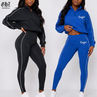 Ensemble 2 pièces personnalisé pour femme avec logo, pull demi-zip à rayures latérales et leggings très élastiques, survêtement de sport et tenue décontractée