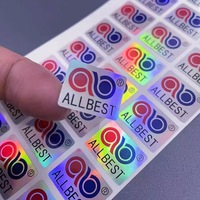 Autocollant laser PVC argenté personnalisé avec surface transparente brillante Étiquettes d'emballage scellées avec logo personnalisé