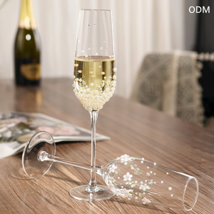 Gobelet à vin <span class=keywords><strong>de</strong></span> mariage <span class=keywords><strong>blanc</strong></span> haut <span class=keywords><strong>de</strong></span> gamme fait à la main, verre transparent en <span class=keywords><strong>cristal</strong></span> <span class=keywords><strong>de</strong></span> perle écologique pour le <span class=keywords><strong>champagne</strong></span> - Product Image 1