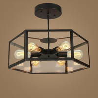 Lustre contemporain à quatre lumières avec abat-jour en verre et structure en métal noir, hauteur réglable, pour la maison, les restaurants et les salles à manger