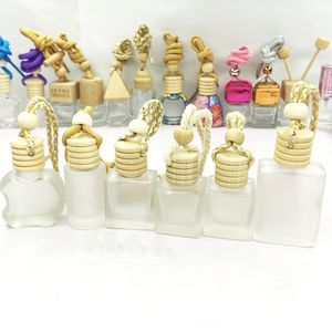 ที่กระจายน้ำหอมในรถแบบหลายช่อง,ขวดน้ำหอมแก้วเปล่าสีขุ่นตัวปรับอากาศจี้น้ำหอมขวดกระจายน้ำมันหอมระเหย - Product Image 1