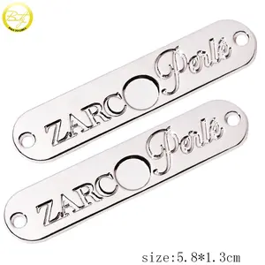Accessorio per abbigliamento in lega di zinco loghi per etichette in argento targhetta stampata personalizzata targhetta per cucire in metallo per jeans