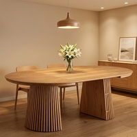 Table à manger ronde minimaliste avec plateau extensible transformable en table longue pour les réceptions