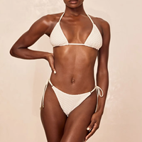 Vente Flash : Bikini deux pièces pour femme, personnalisé avec logo OEM, en nylon et élasthanne blancs, écologiques, séchage rapide, col halter, bas brésilien