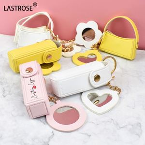 พวงกุญแจหนัง PU คุณภาพสูง พร้อมช่องใส่ลิปบาล์ม ขายส่ง กล่องใส่ลิปสติกแบบพกพา พวงกุญแจใส่ลิปกลอส - Product Image 1