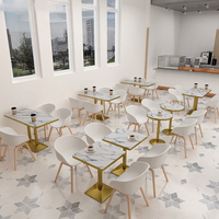 Zone de Relaxation nordique Table basse chaise ensemble Simple Restaurant dossier en plastique chaises hôtel hall négociation réception chaises