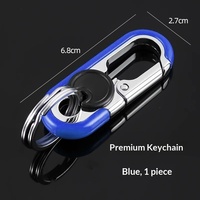 Porte-clés décontracté bicolore pour homme, créatif, double anneau en alliage de zinc et acier inoxydable, forme ovale, pour clés de voiture et motos
