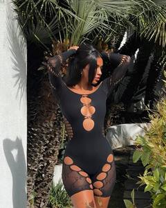 Combinaison moulante sexy à manches longues, en dentelle ajourée, avec décolleté en V et effet transparent - Product Image 4